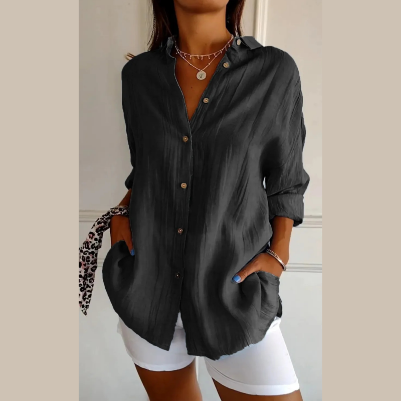 Damenbluse mit klassischem Revers und Faltenstruktur